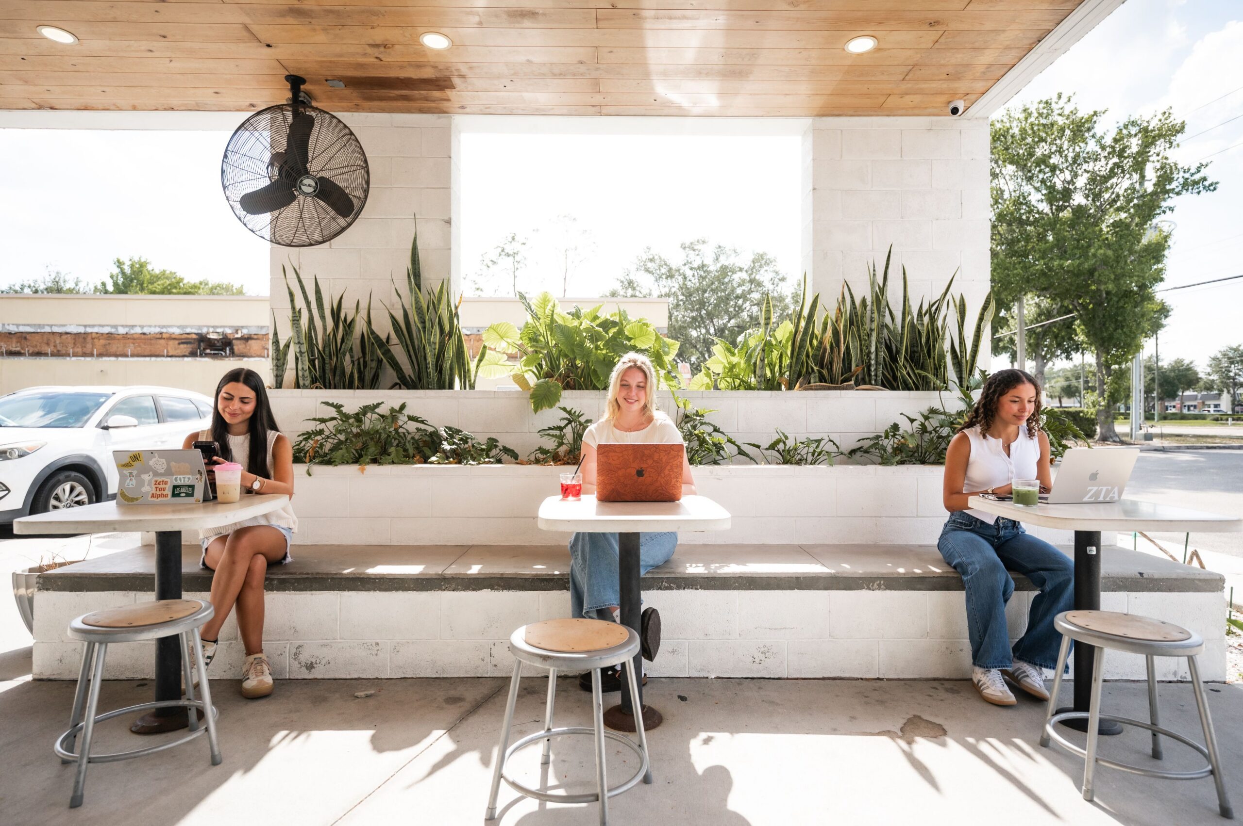 remote work on shaded outdoor patio scaled