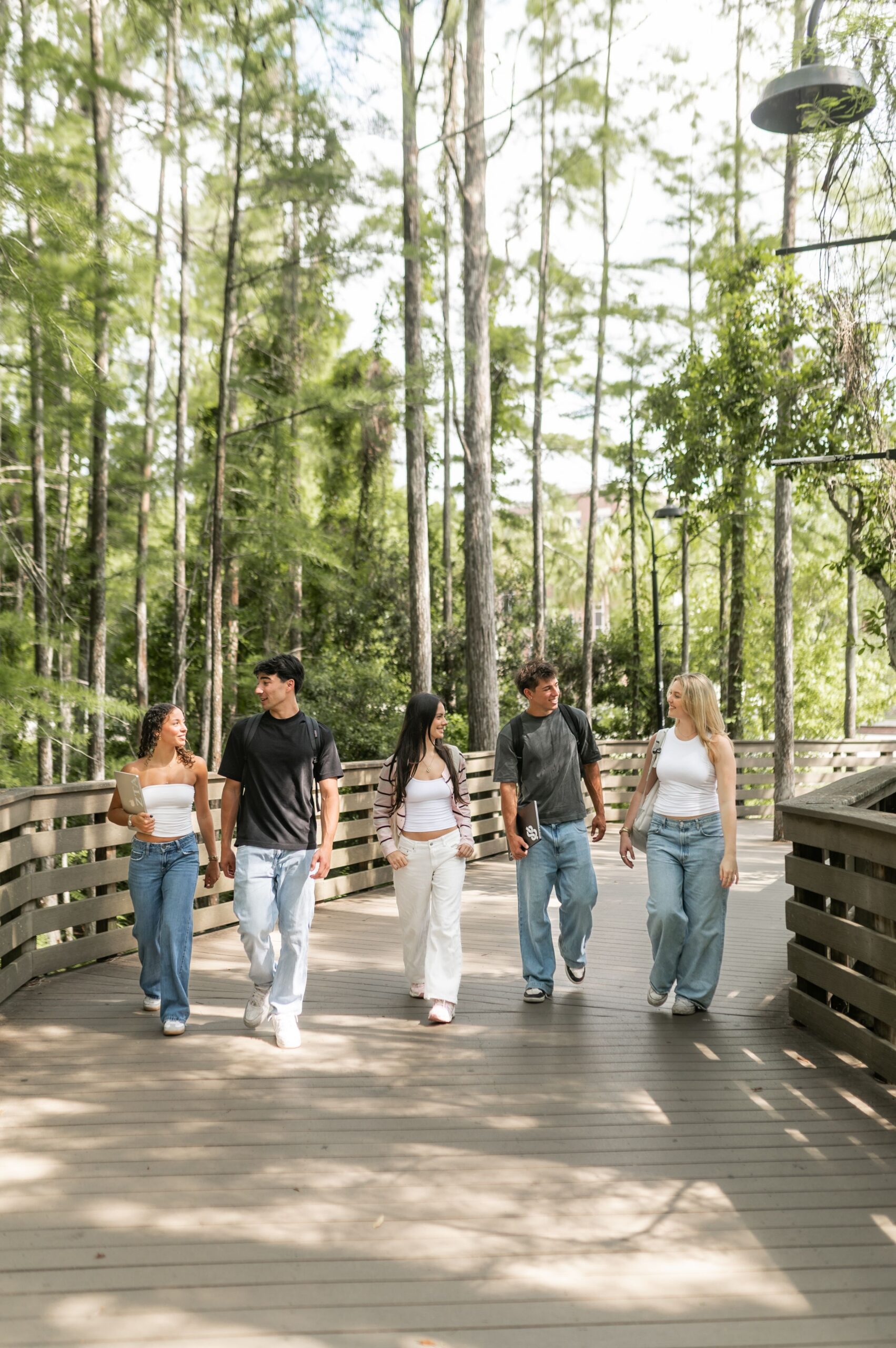 Students walking along boardwalk